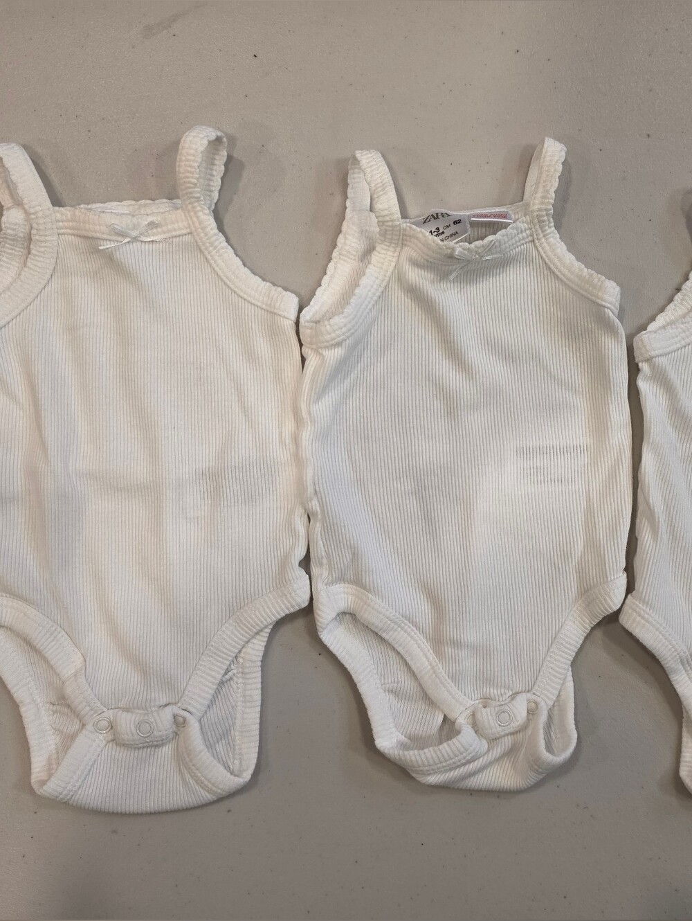 Three Pack Strappy Ribbed Bodysuit
